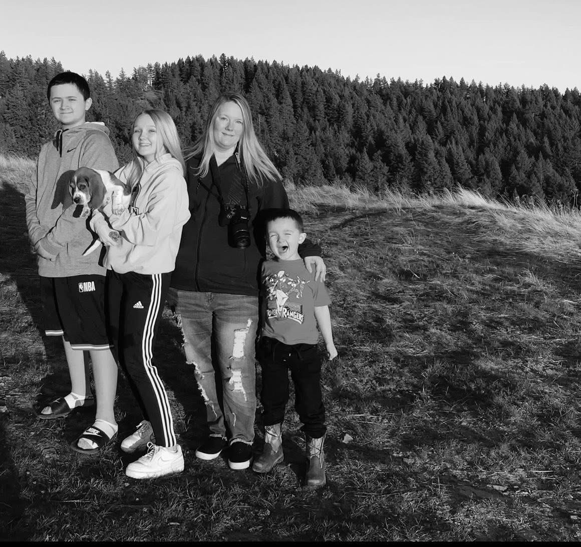 Amie and her family outdoors